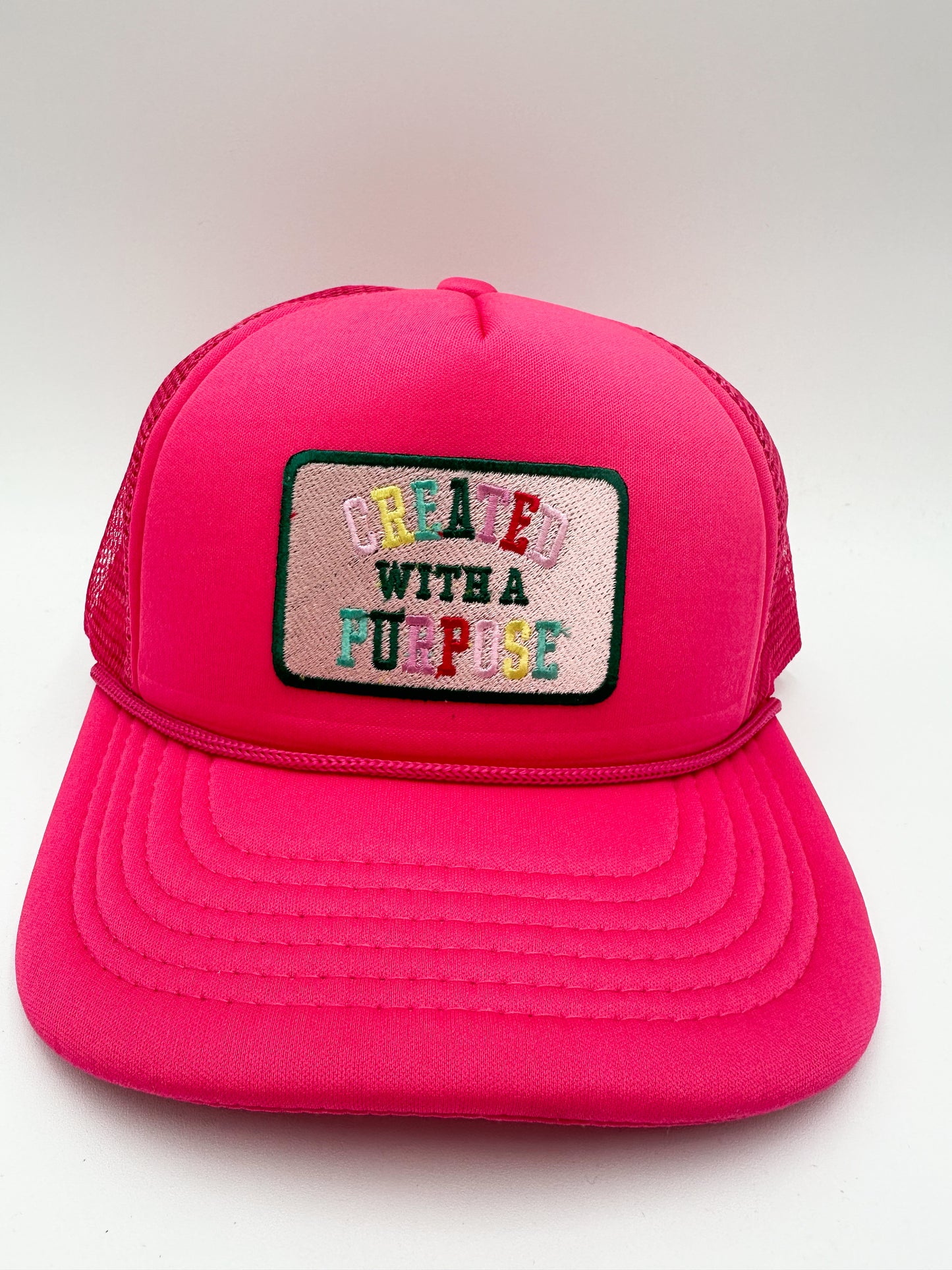 Created with a purpose hot pink trucker hat